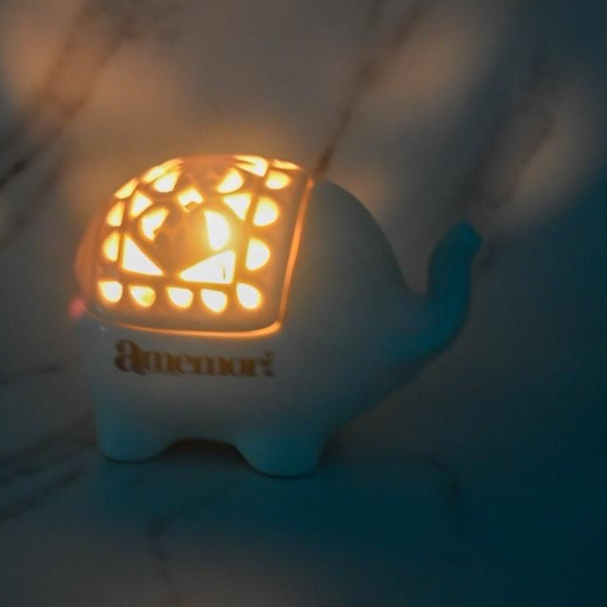 Luminous Guardian ~ Like the elephant, carry strength gently.