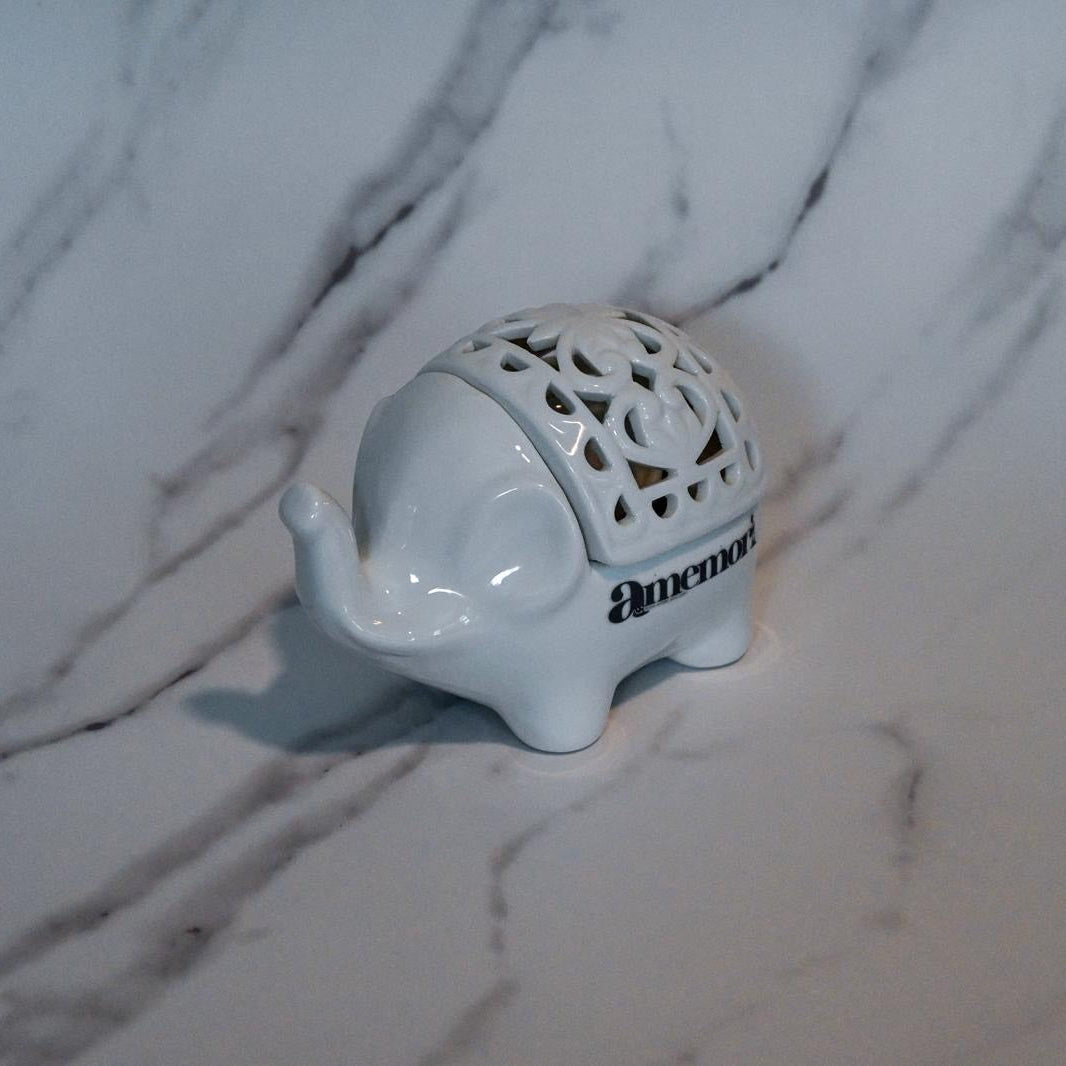 Luminous Guardian ~ Like the elephant, carry strength gently.